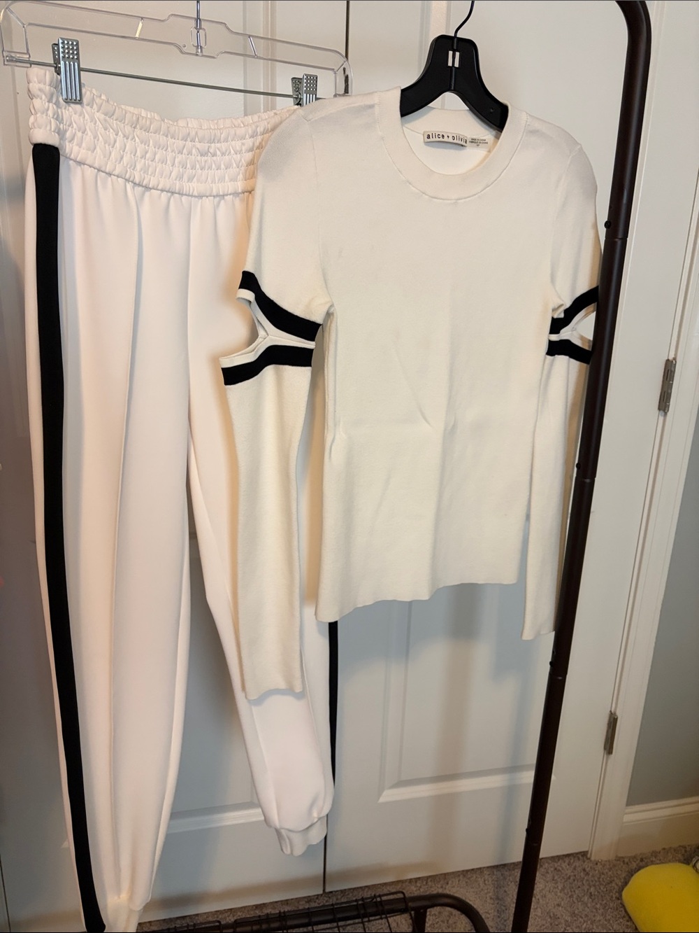 Alice + Olivia White Knit Top with Black Sleeve Stripes and cut outs - Picture 5 of 5